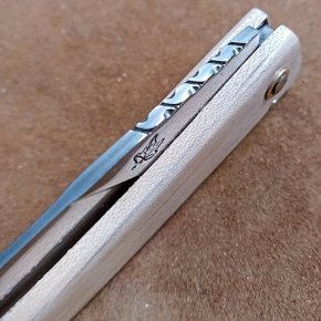 couteau pliant à friction